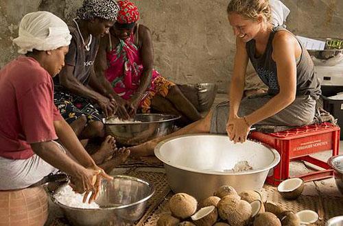 Charlotte Leger with local women. © OceansWatch www.oceanswatch.org